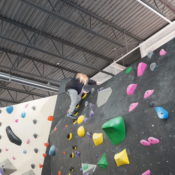 ASC MB Athlete Getting To The Top Of The Wall At The Hive